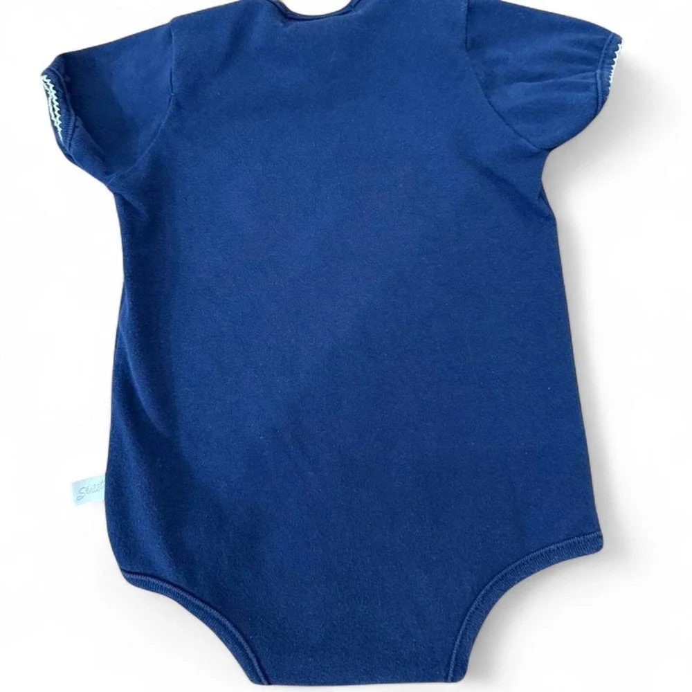 Navy blue BYU baby onesie with trim white stitching